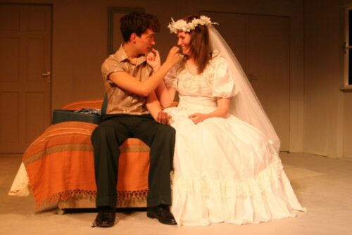 Wilson Smith as Benjamin Braddock and Frances McKinnel as Elaine Robinson