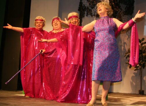 Lola and her backing group sing "What ever Lola wants, Lola gets!"