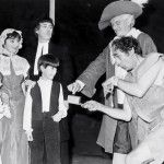 A penny for the fool. L/R Karen Powe, Chris Jackson, Ian Mitchell, Richard Rollinson, Ted Younghusband and Ron Dickens as the Fool.