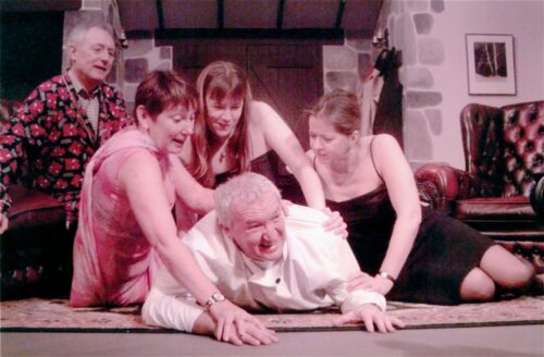 Ladies Man- George The Chef, Derek Thompson Is Wrestled To The Ground By The Ladies. L/R Jenni Rushton As Jacqueline, Sarah Warner As Suzette And Jane Douglas As Suzanne. Ian Mitchell, Who Plays Host Bernard, Is In The Background