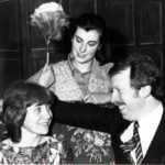 Beth Barton (Jane Dickens)listens In As John Danby (Steve Baxter) And Susan Wagstaffe (Sylvia Heaney) Talk On The Sofa.