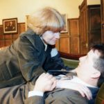 Sylvis Heaney as Miss Frobisher tries to take advantage of Philip Mackie as Rodney Campbell