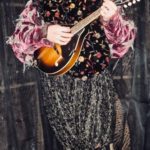 Bob Hallard as the Minstrel