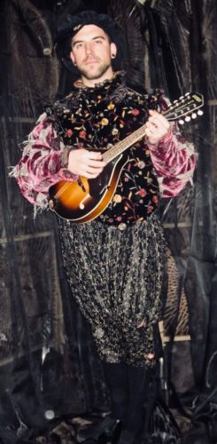 Bob Hallard as the Minstrel