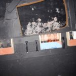 The bottles in the back of the ship