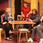 The cast in rehearsal
