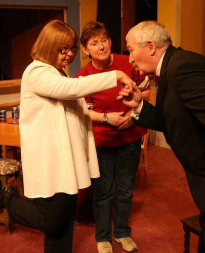 Derek Thompson As Manolo Costazuela Takes A Shine To Liz Chapman As Florence. Jenni Rushton As Olive Looks On.