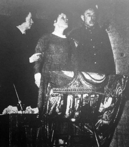 Sarat Carn (Barbara Hunter) is restrained by the warder (Charles Wheeler) and wardress (Mary Brown)