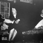 Miss Skillon (Mary Brown) renders first-aid to the Vicar's injured knee