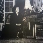 Miss Forbes (Valerie Banner Mendus) finds the body and the plot thickens