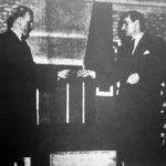 Norbury (D.H. Evans) hands over the gun to the Inspector (J.H.Gale)