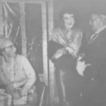 Chloe (played by Dorothy Powers) "sweetens" up her "boy friend" Hobby (played by Haydn Hanna), while a rather disgusted Mrs Parsons (played by Audrey Chandler) looks on