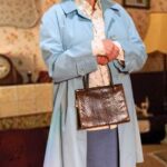 NORA BATTY played by Sarah Delorme