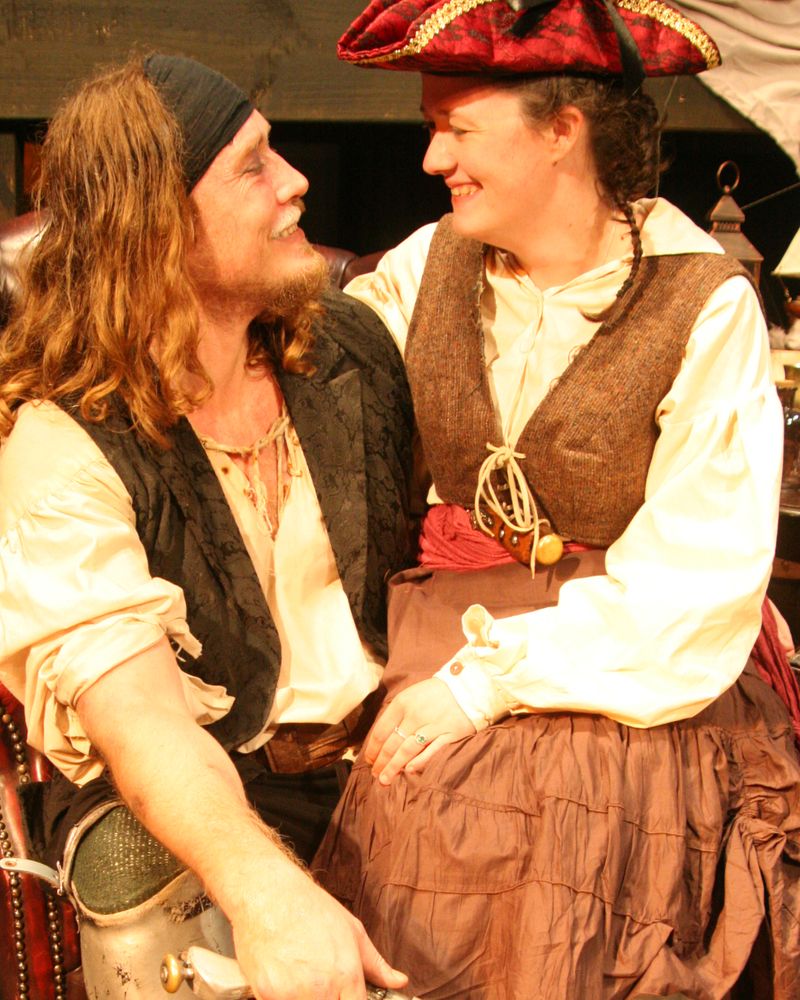 Long John Silver (David Aitken) with the love of his life Annie Gibbs (Shania Wilson)