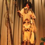 Christian Hogan as Benn Gunn with Benny the skeleton.