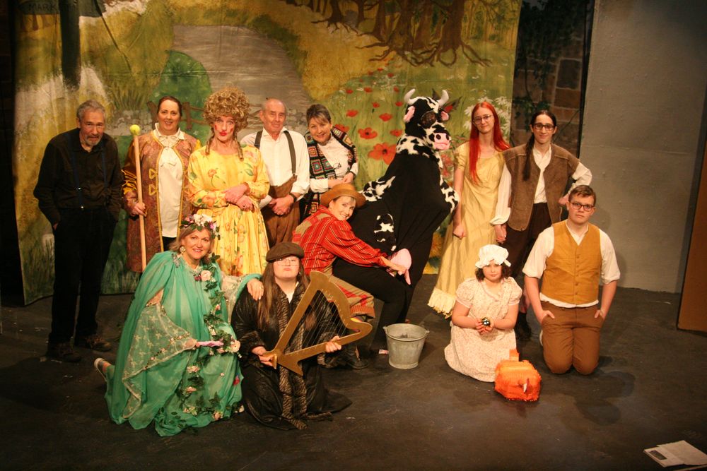 Most of the Jack and the Beanstalk Cast enjoying wearing their costumes for the first time! Simple Simon - What are you doing to that cow?